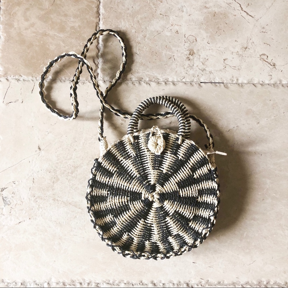 Round cross body woven straw purse black tan